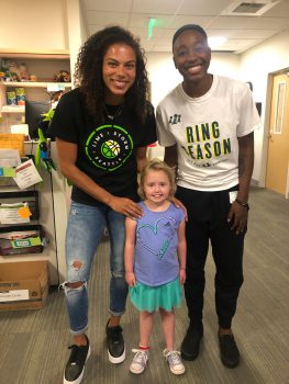 Clark, Loyd and Lucy pose for a photo at Seattle Children's. 
